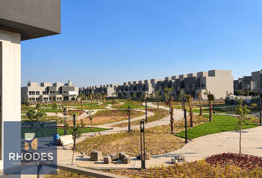 3 Modern Townhouses Over a Landscaped Park. png