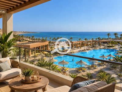2 Bedroom Chalet for Sale in Ain Sukhna, Suez - Luxury Balcony Overlooking Tropical Resort Pool. png