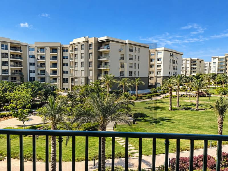 5 Sunlit Apartment Courtyard with Palm Gardens. png