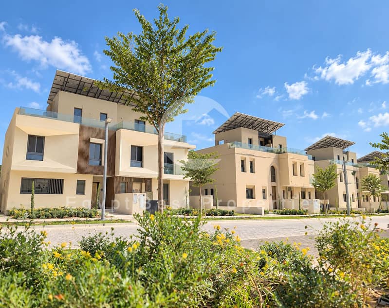 4 Sunlit Villas with Lush Landscaping. png