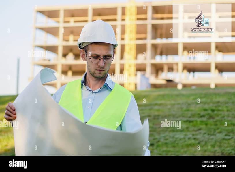 9 civil-engineering-wearing-white-helmet-on-construction-site-looking-at-plan-building-inspector-2JBWCK7. jpg