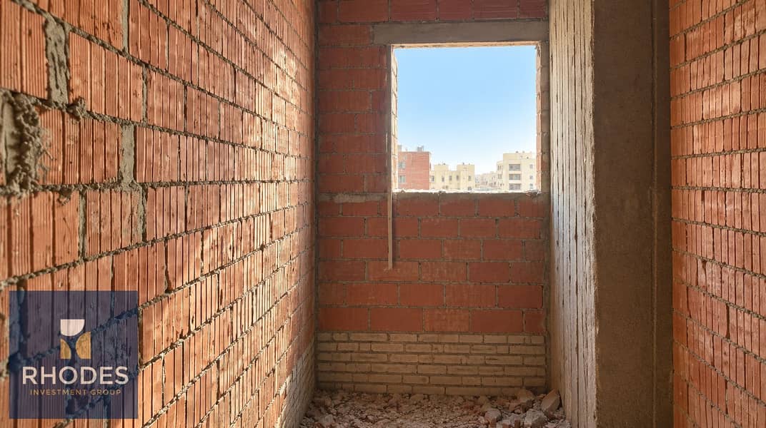5 Sunlit Unfinished Brick Corridor. png