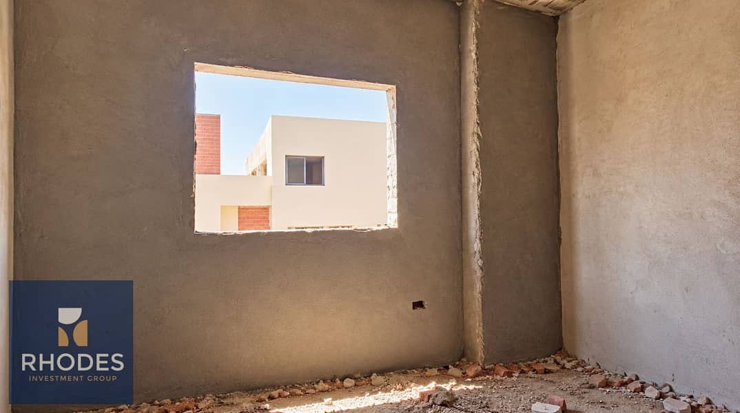8 Sunlit Unfinished Room with Window. png