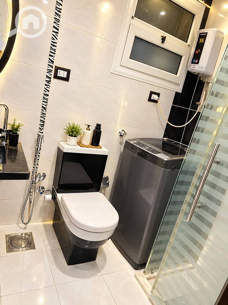 3 Modern Monochrome Bathroom Laundry Nook. png