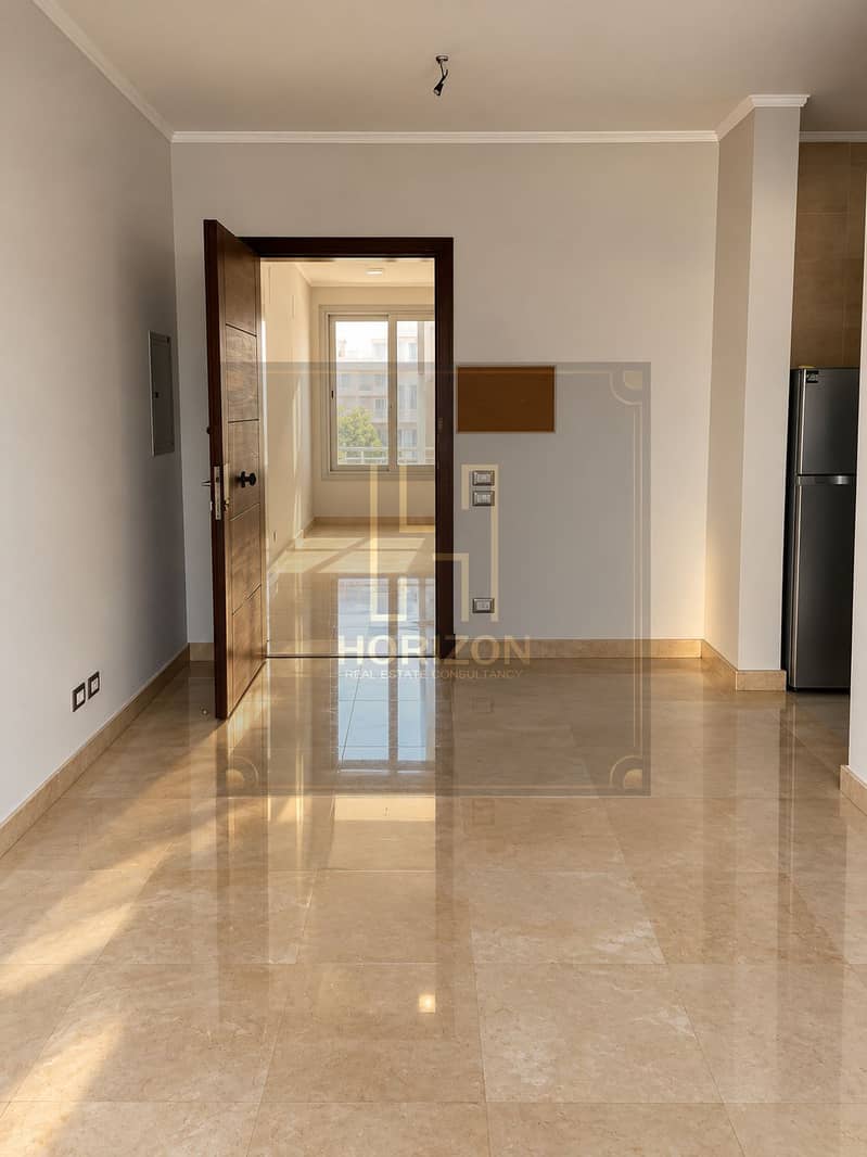 6 Sunlit Minimalist Interior with Open Door. png
