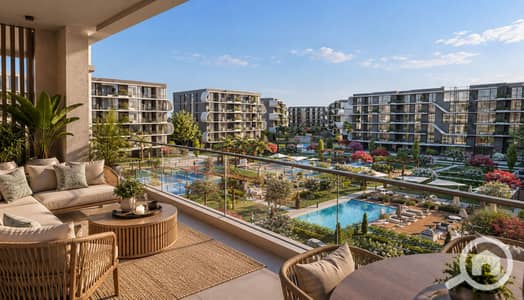 2 Bedroom Apartment for Sale in Sheikh Zayed, Giza - Upscale Terrace Overlooking Resort Courtyard. png