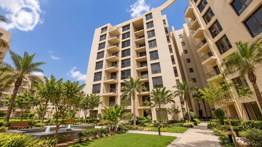 فلیٹ 1 غرفة نوم للبيع في العاصمة الإدارية الجديدة، القاهرة - Modern Courtyard with Water Feature and Palms. png