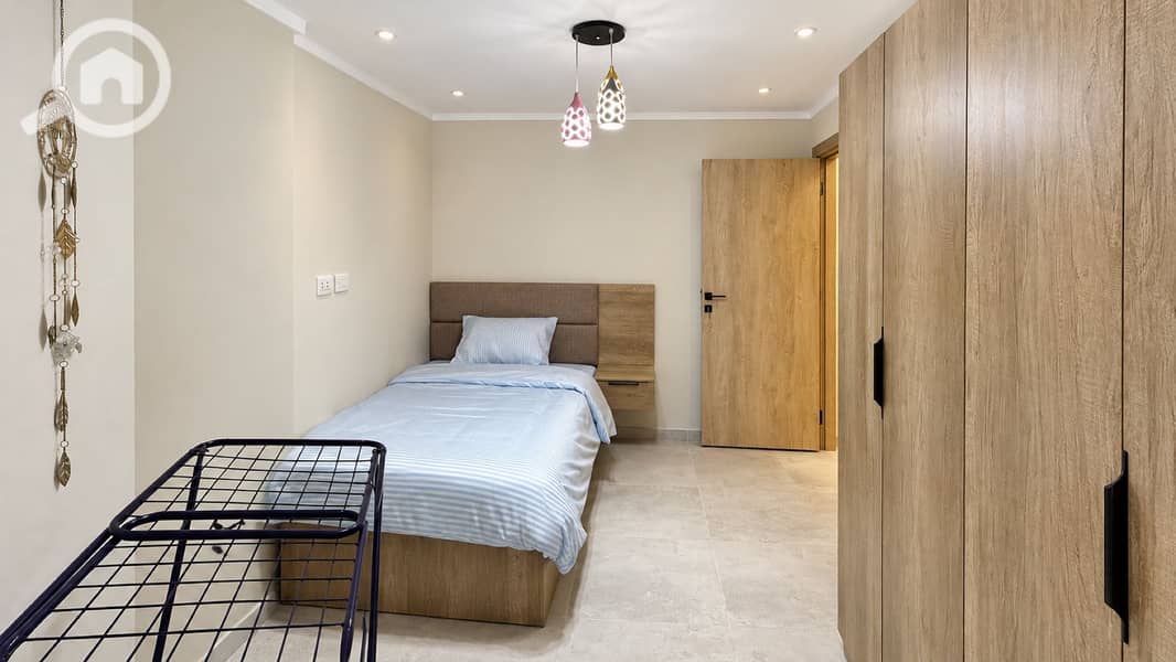 12 15-secondary-bedroom-wide. jpg