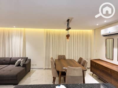 2 Bedroom Flat for Rent in New Cairo, Cairo - Warm Modern Living-Dining Room. png