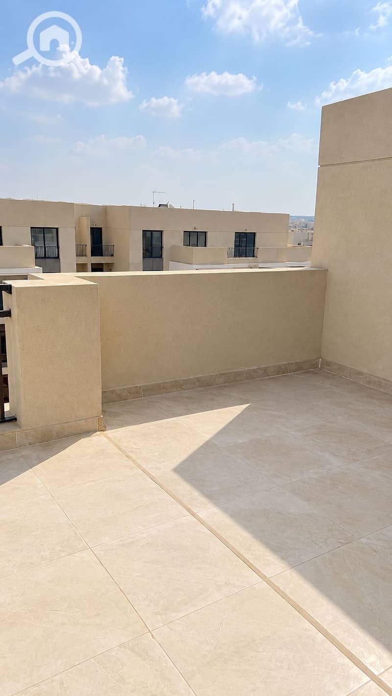 2 Sunlit Minimalist Rooftop Terrace. png