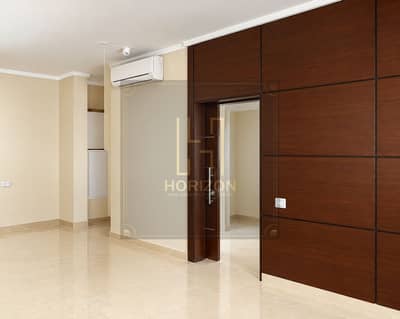 استوديو للايجار في القاهرة الجديدة، القاهرة - Minimal Modern Room with Wood Accent Wall. png استوديو للايجار في القاهرة الجديدة، القاهرة - Minimal Modern Room with Wood Accent Wall. png