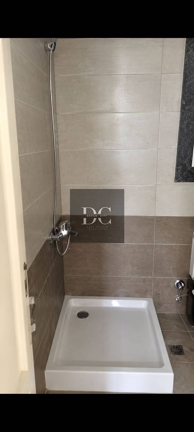 5 Modern Two-Tone Tiled Shower Room. png