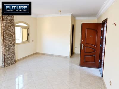 3 Bedroom Apartment for Sale in Zahraa Al Maadi, Cairo - Bright Empty Apartment Interior with Open Wooden Door. png