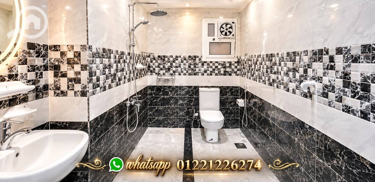 5 Luxurious Black and White Marble Bathroom. png