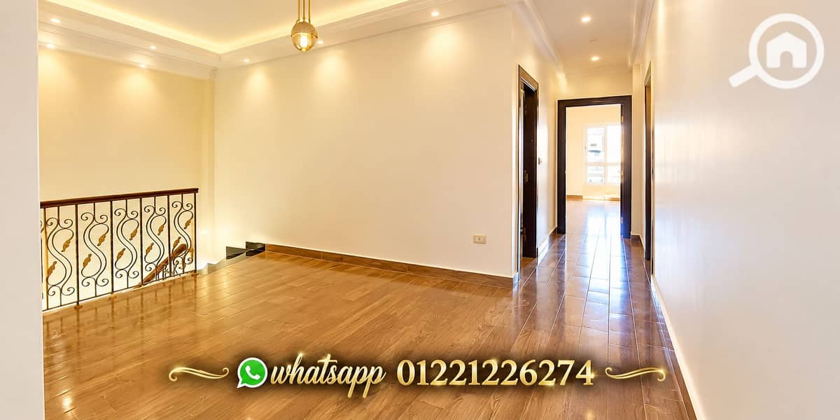 7 Warm Modern Hallway with Stair Landing. png