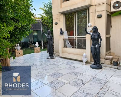 2 Bedroom Apartment for Sale in Sheikh Zayed, Giza - Classical Sculpture Courtyard in Daylight. png