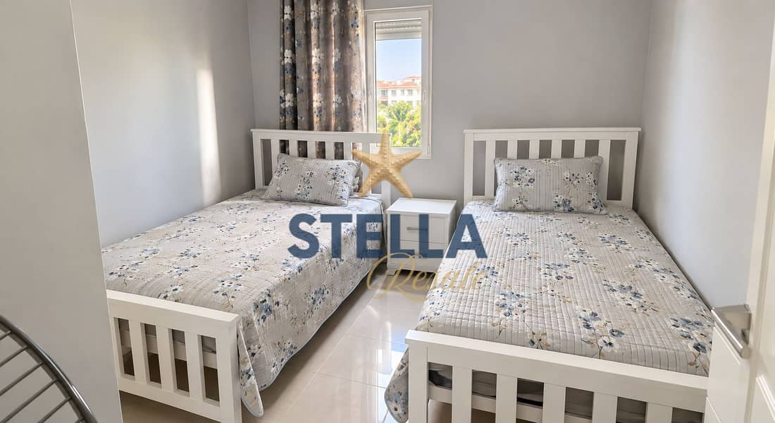 10 Bright Twin Bedroom with Floral Bedding. png