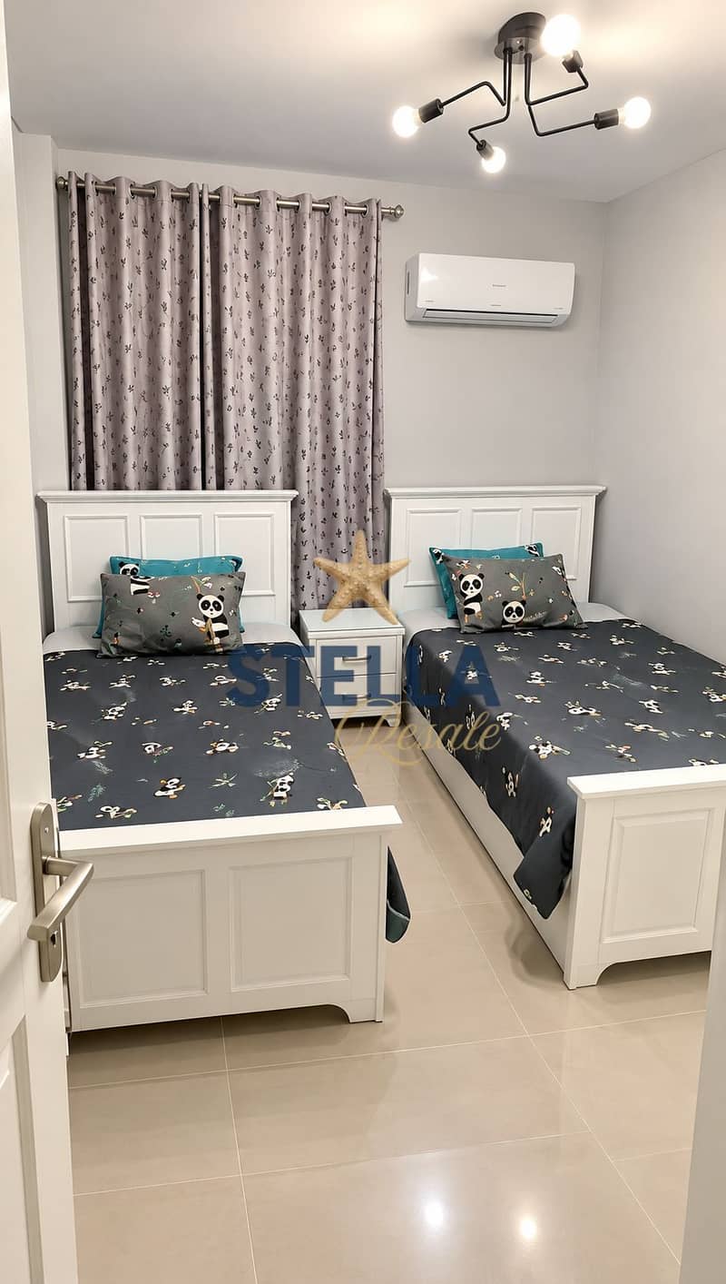 12 Symmetrical Panda-Themed Twin Bedroom. png