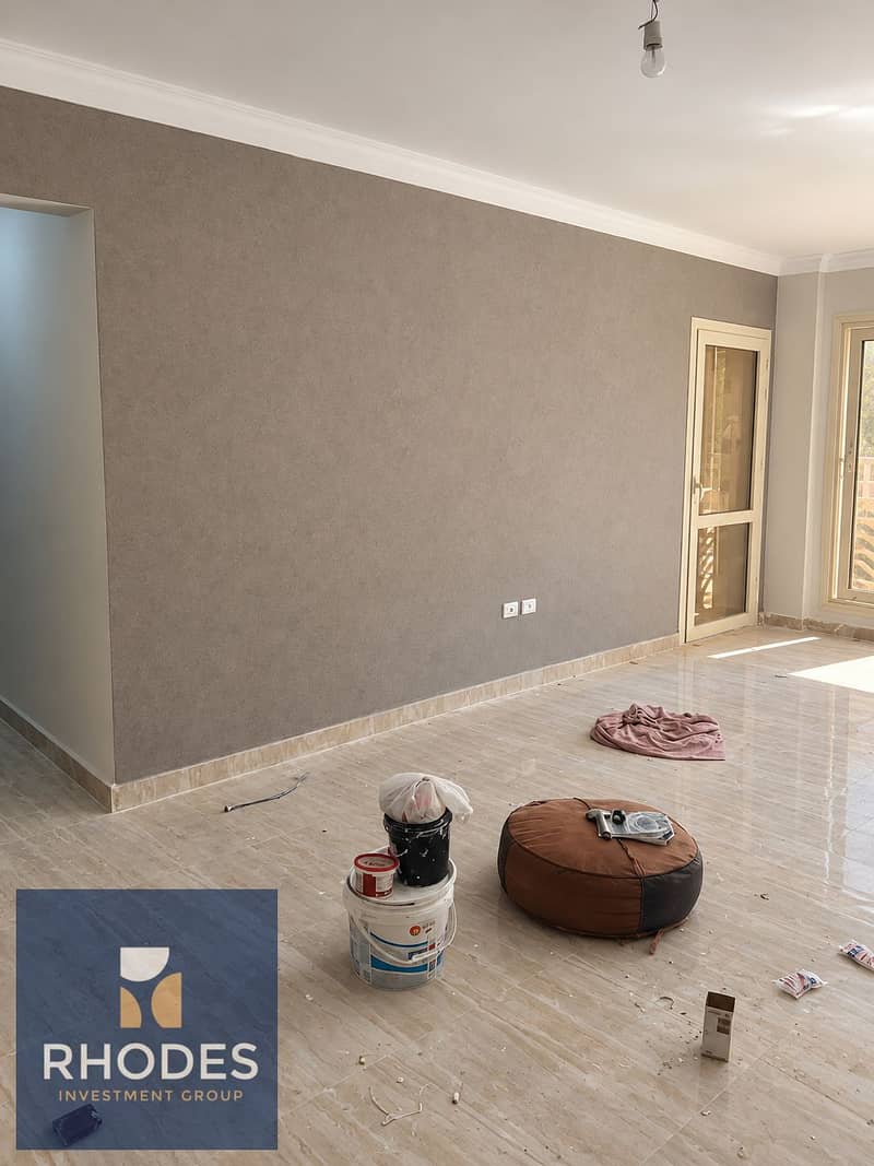 3 Sunlit Taupe Room Under Renovation. png