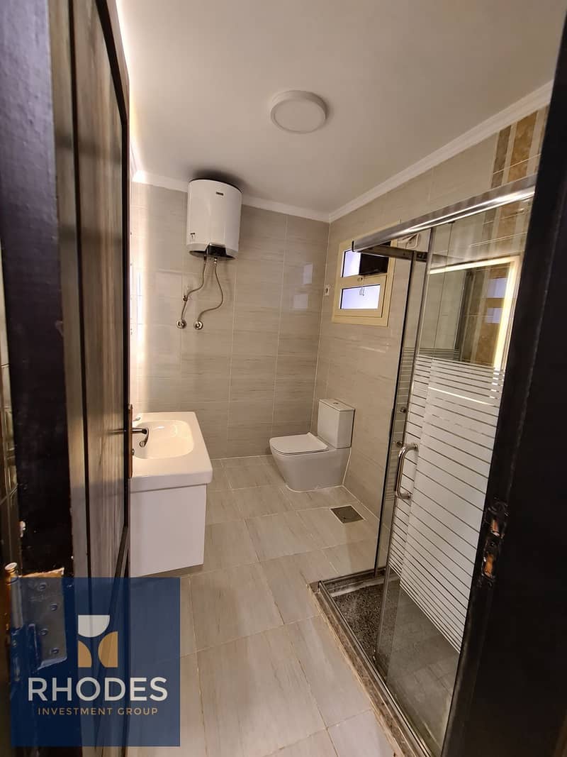 9 Modern Bathroom Viewed Through Doorway. png