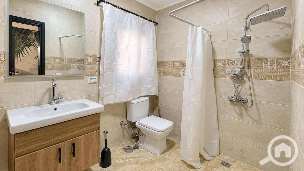 10 09-bathroom-shower-overview. jpg