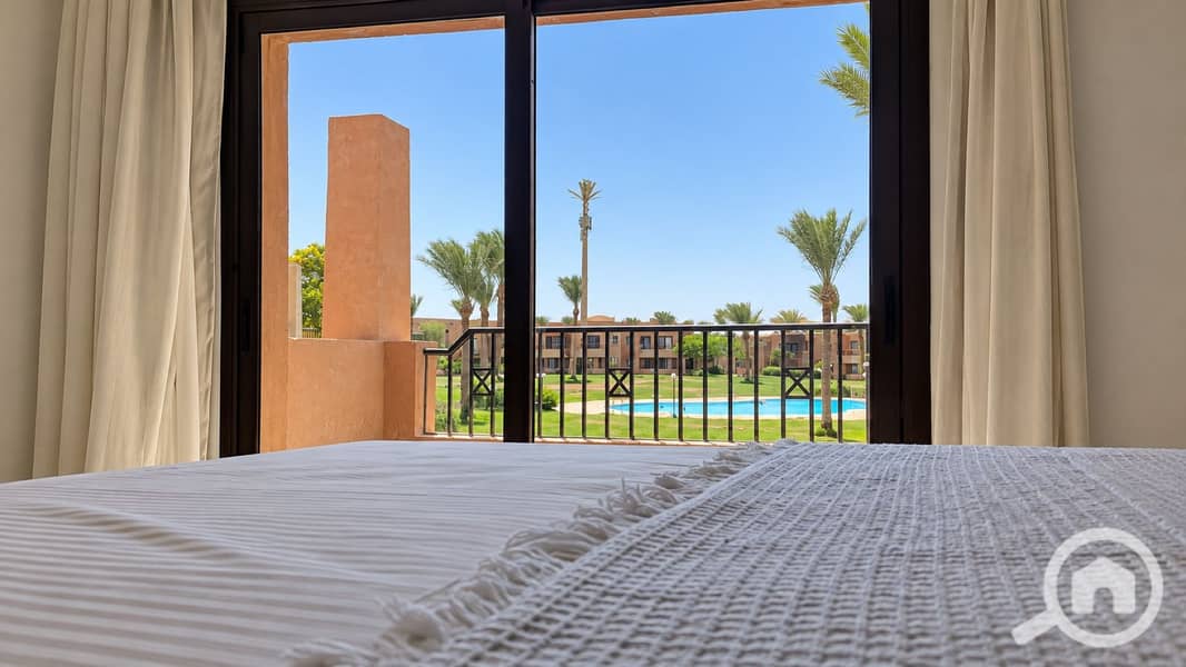 15 15-bedroom-pool-view-from-bed. jpg
