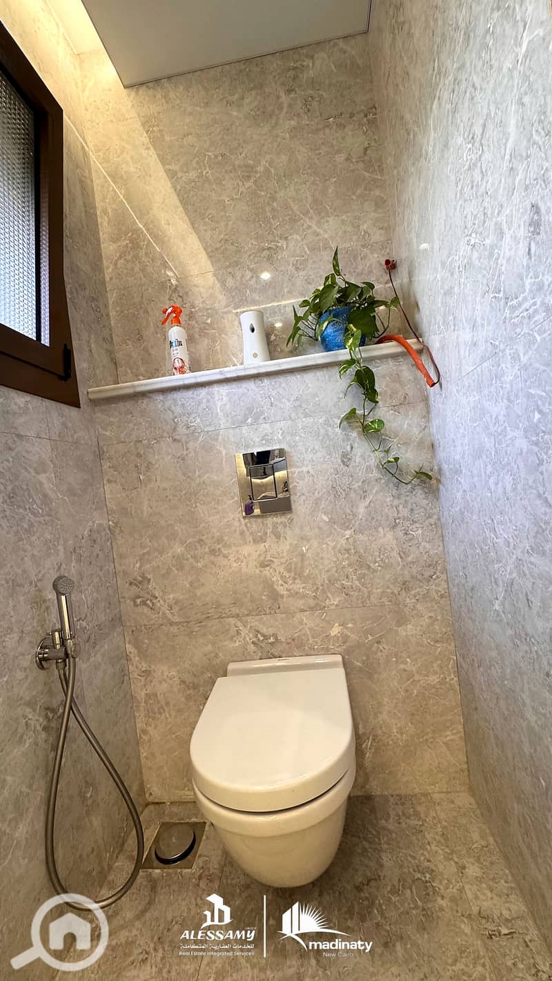 5 luxury_standalone_villa_for_sale_in_madinatybathroom_enhanced_4k_with_original_logo. png