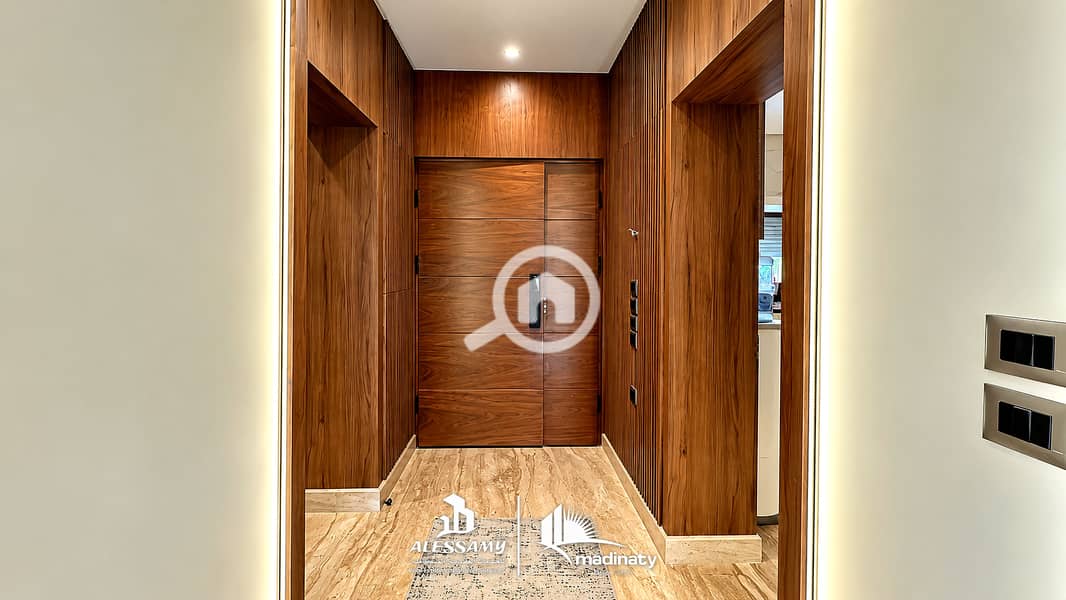 10 luxury_standalone_villa_for_sale_in_madinatyhallway_with_exact_logo_4k. jpg