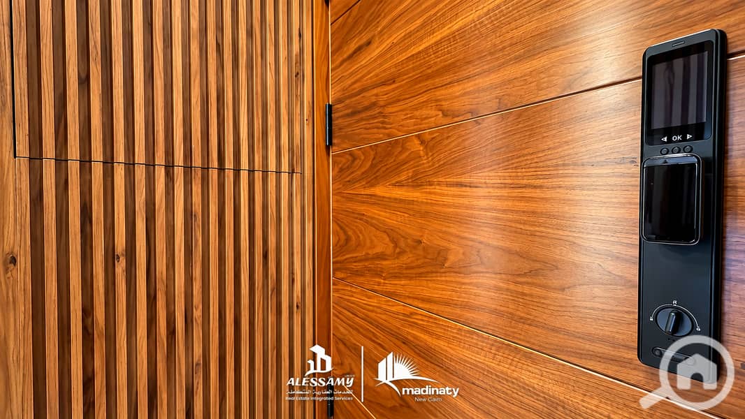 11 luxury_standalone_villa_for_sale_in_madinatydoor_lock_angle2_with_logo_4k. jpg