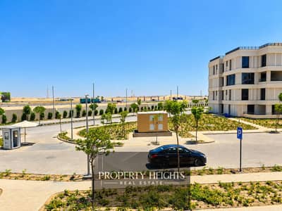2 Bedroom Apartment for Sale in Sheikh Zayed, Giza - Sunlit Modern Suburban Streetscape (1). png