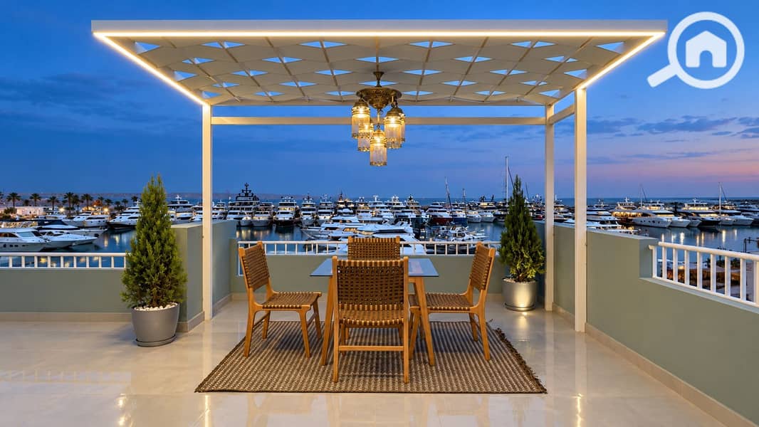 9 28-terrace-dining-marina-dusk. jpg