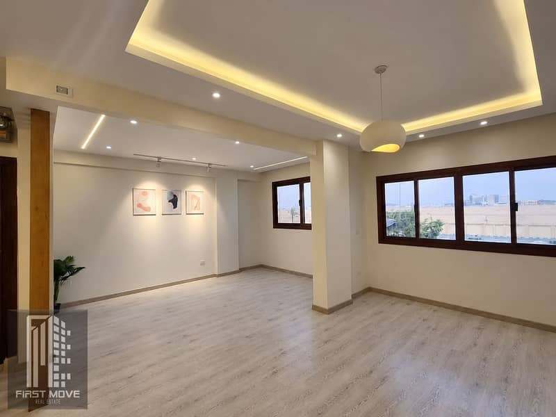 3 Minimalist Open-Plan Room with Warm Lighting. png