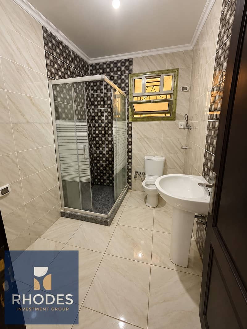 6 Modern Marble Bathroom with Glass Shower. png