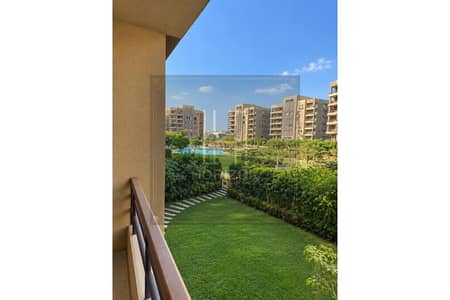 3 Bedroom Flat for Rent in New Cairo, Cairo - Sunny Courtyard Garden from Balcony. jpg 3 Bedroom Flat for Rent in New Cairo, Cairo - Sunny Courtyard Garden from Balcony. jpg