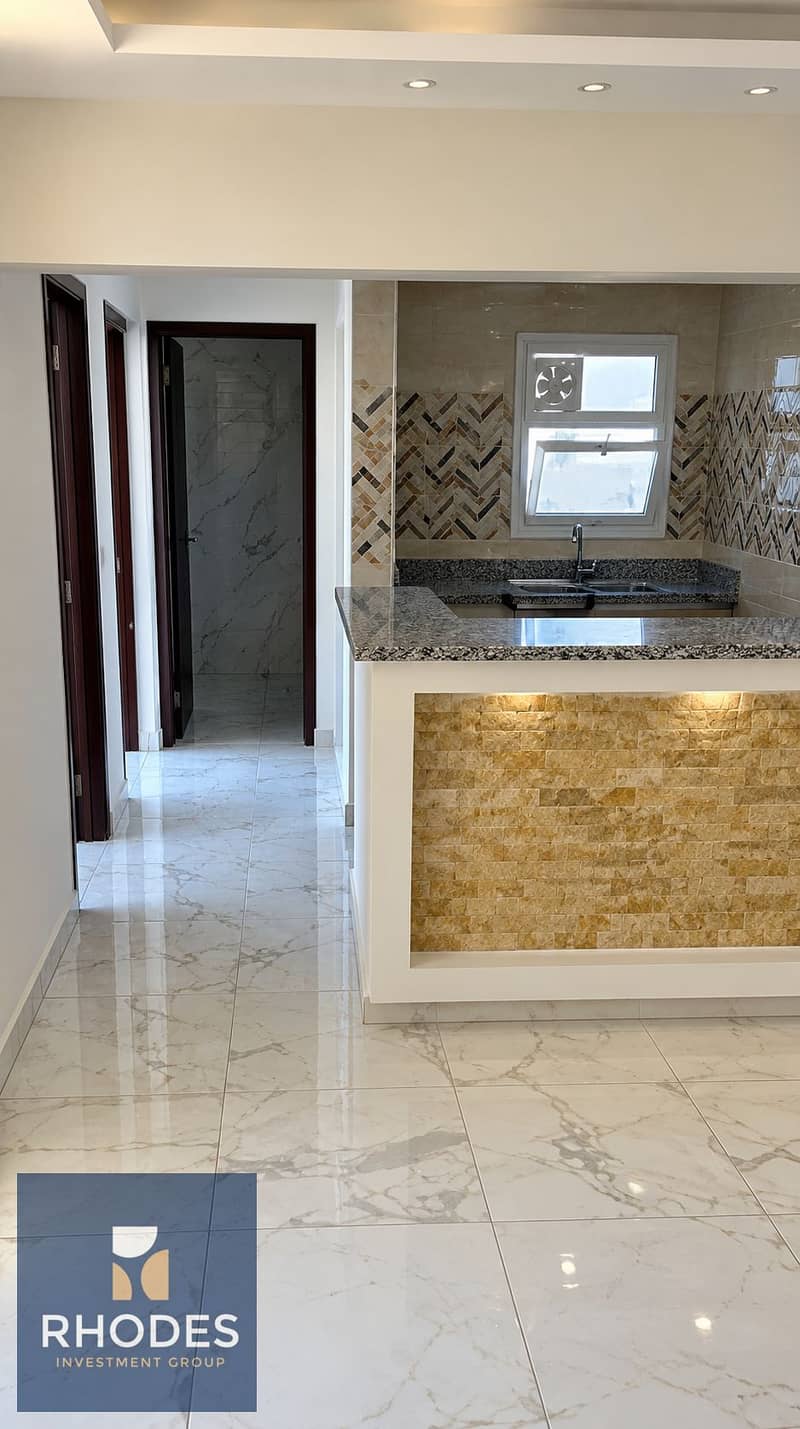 2 Modern Marble Kitchen and Hallway. png