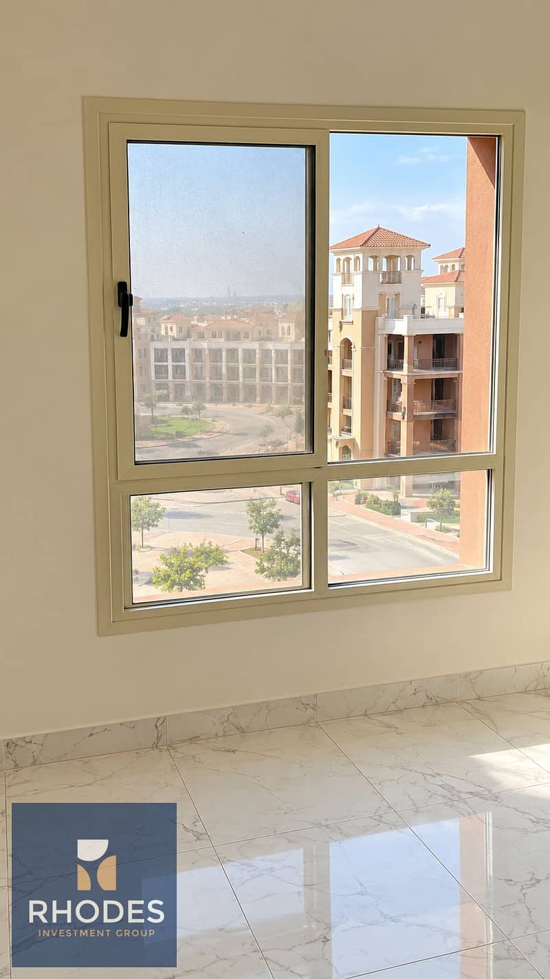 5 Sunlit Empty Room with Four-Pane Window. png
