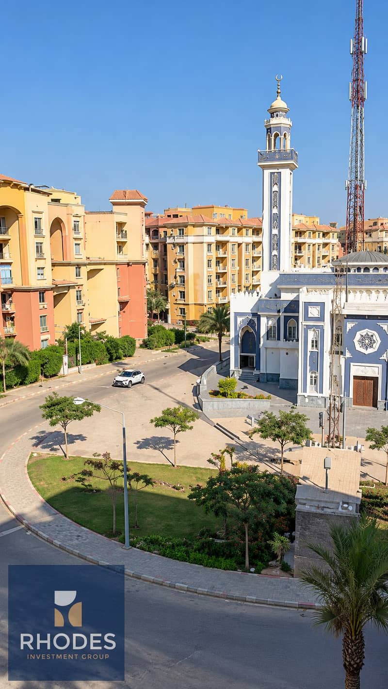 7 Sunlit Mosque Courtyard and Pastel Apartments. png