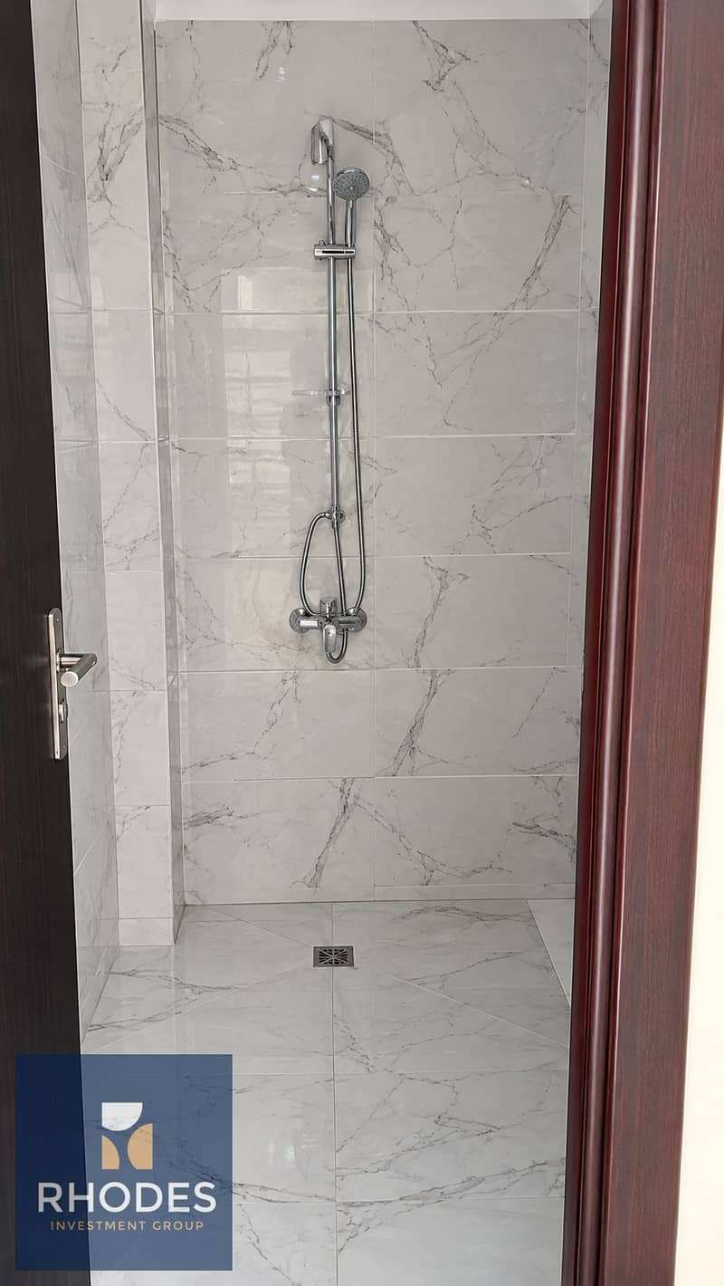 10 Modern Marble Shower with Chrome Fixtures. png