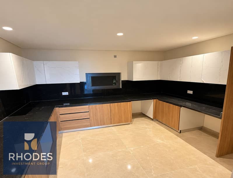 5 Modern Marble and Oak Kitchen. png
