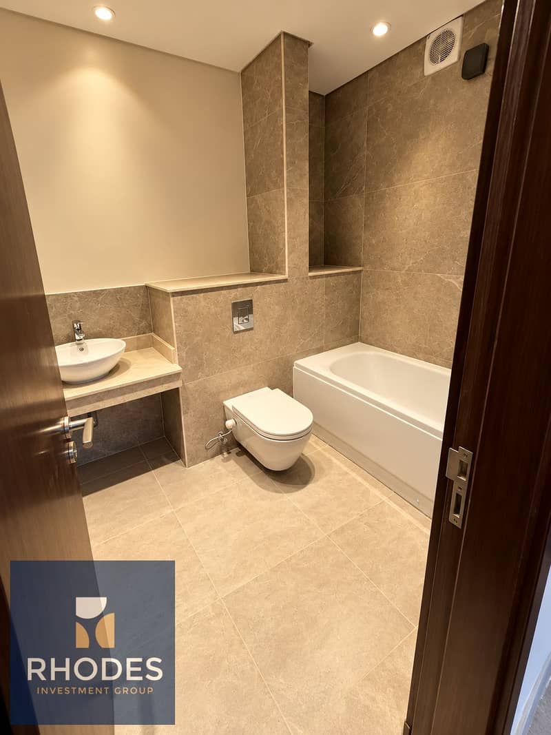 8 Modern Taupe Bathroom Interior. png