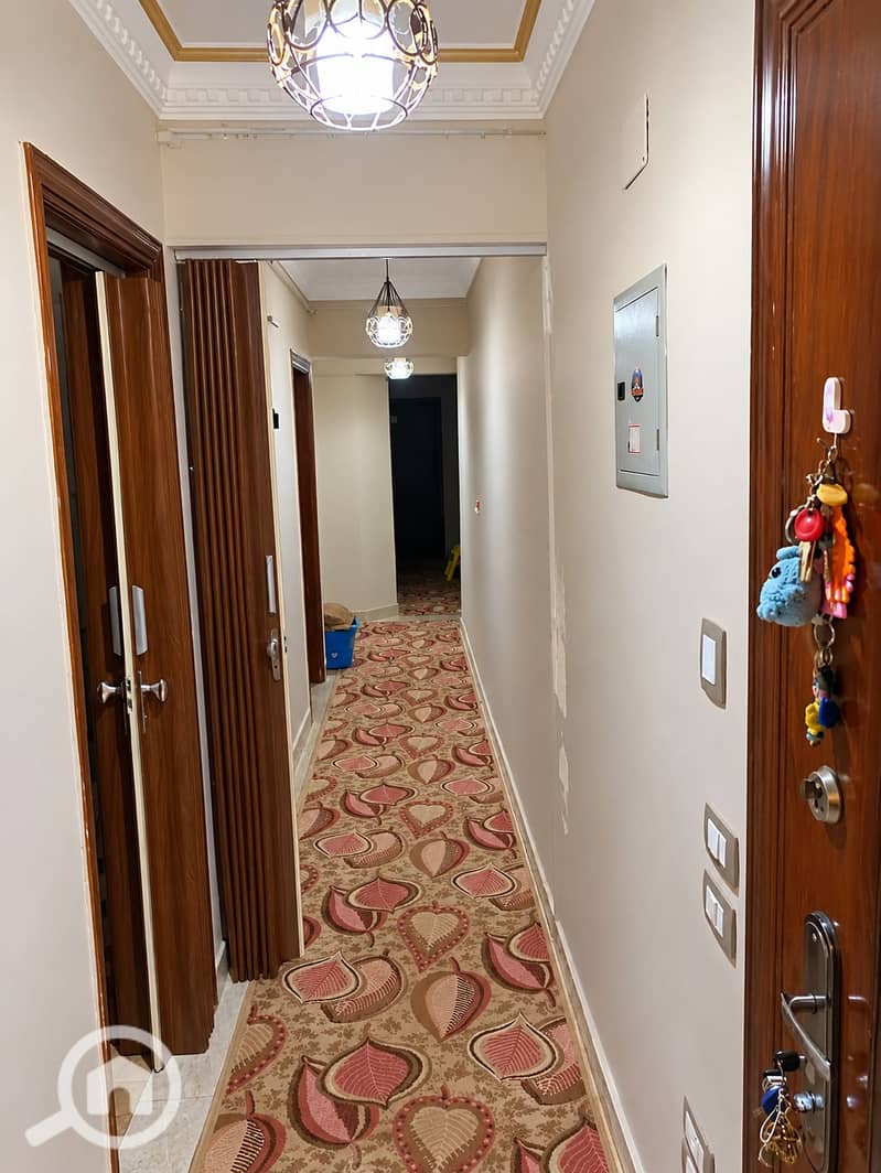 4 Ornate Warm-Lit Hallway. png