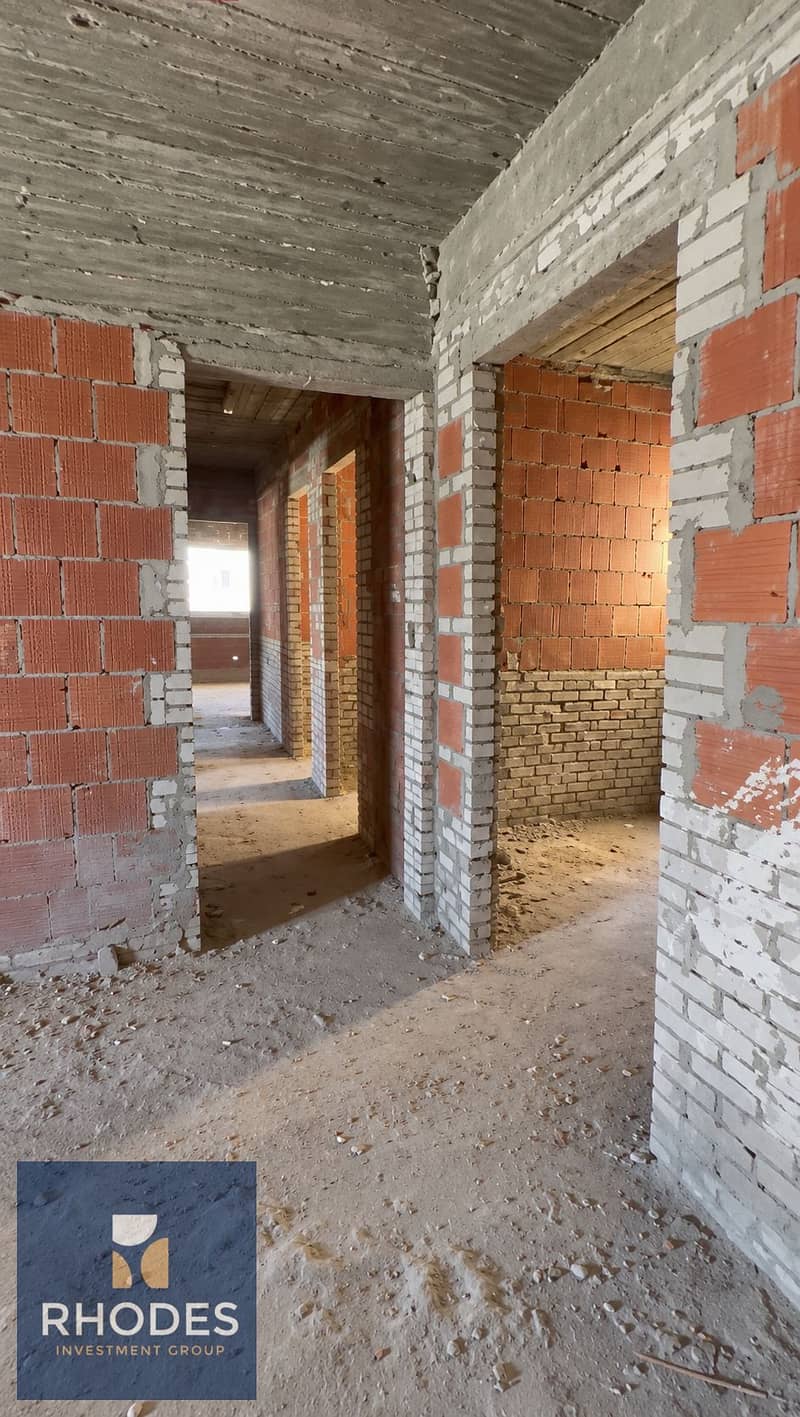 5 Unfinished Brick Corridor with Sunlit Depth. png