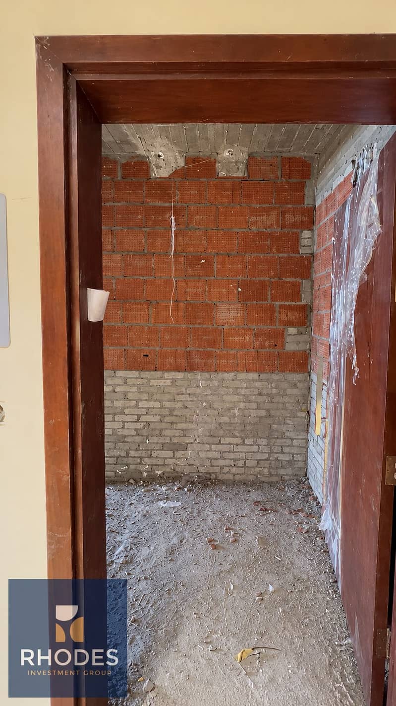 12 Unfinished Brick Room Through Doorway. png