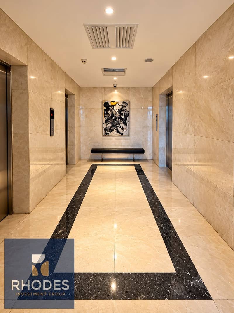 5 Luxurious Symmetrical Marble Elevator Lobby. png