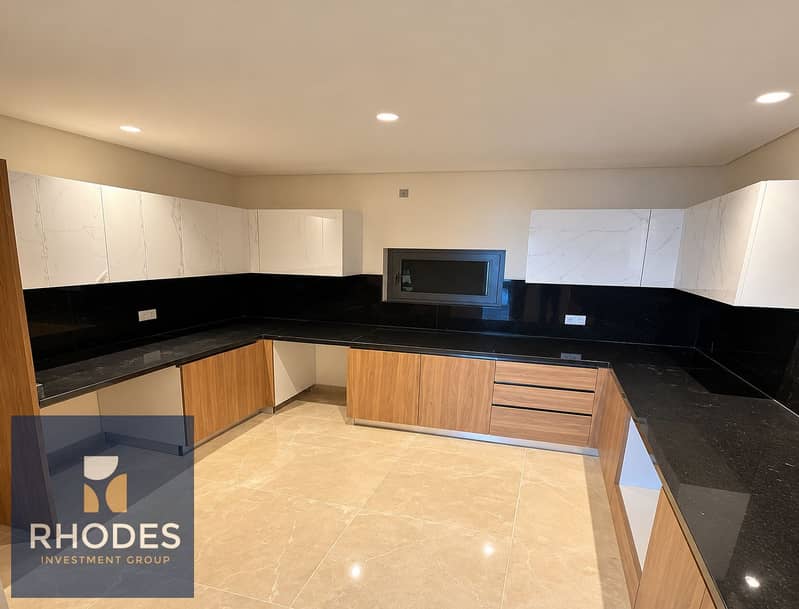 7 Modern Marble and Oak Kitchen. png