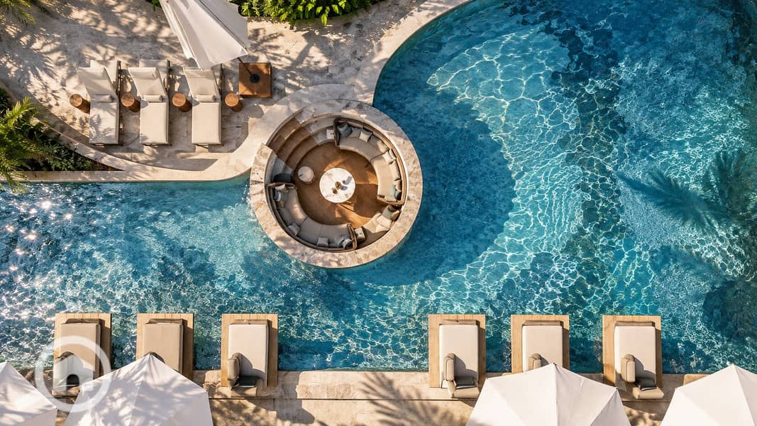 8 Sunlit Mediterranean Resort Pool Retreat. png