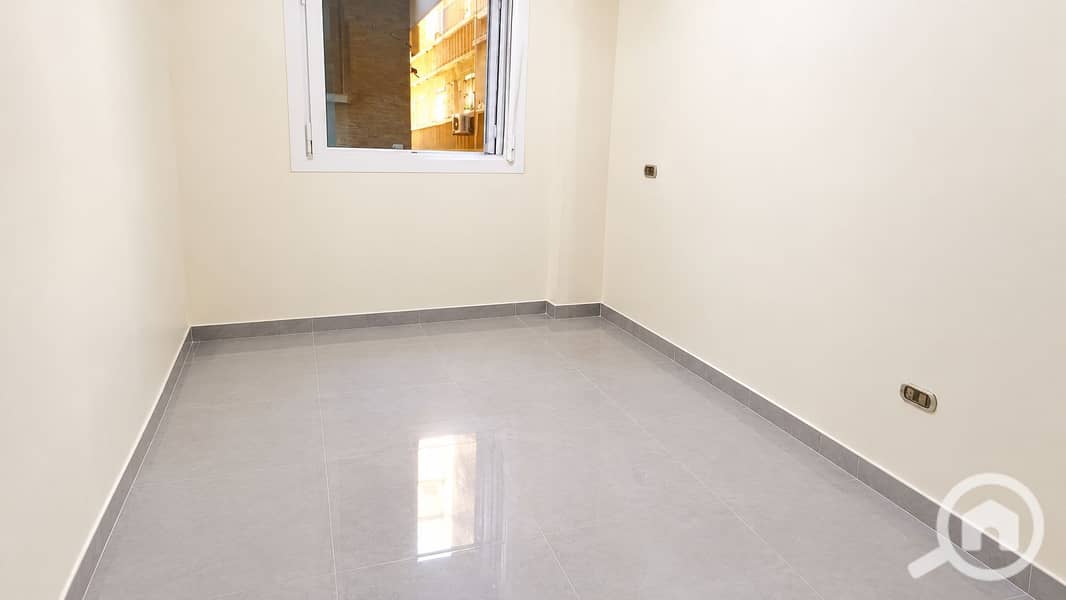 3 Bright Minimalist Room with Window Reflections. png