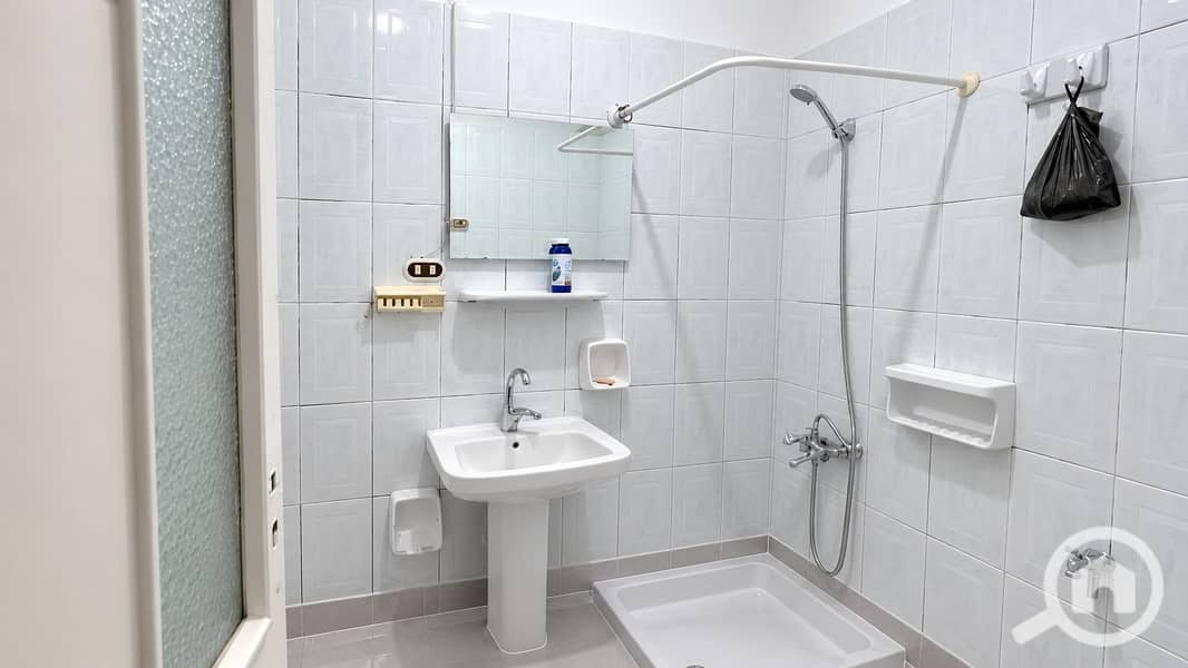 5 Brightly Refreshed Compact Bathroom. png
