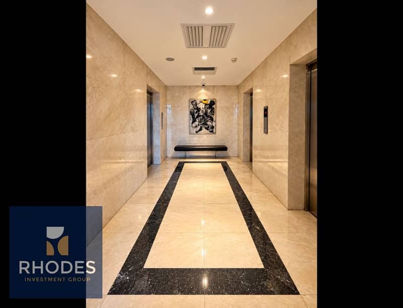 4 Luxurious Symmetrical Marble Elevator Lobby. png