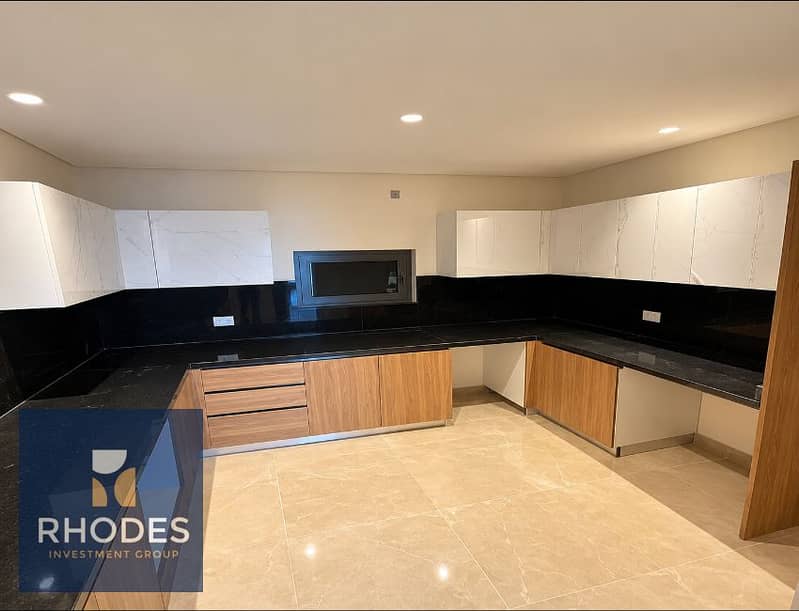 6 Modern Marble and Oak Kitchen. png
